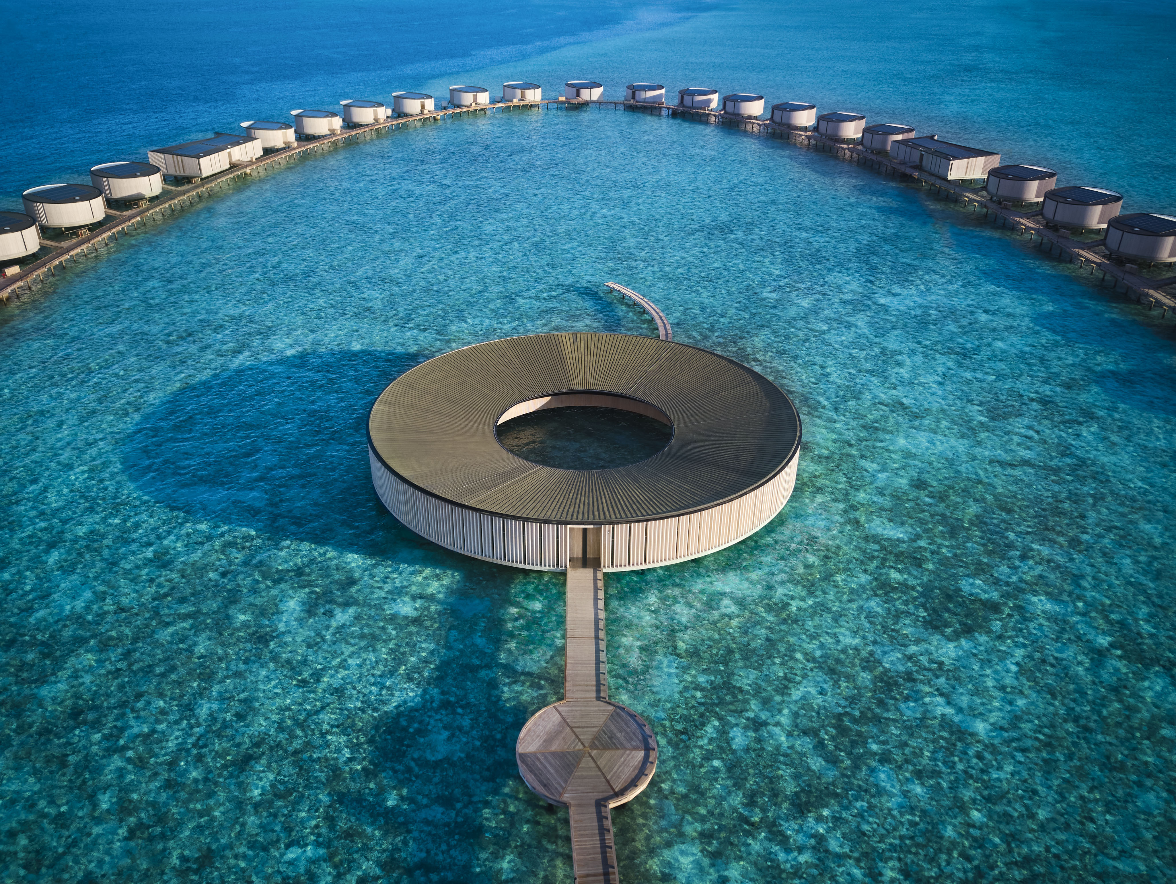 Aerial view of the circular overwater spa at The Ritz-Carlton Maldives, Fari Islands